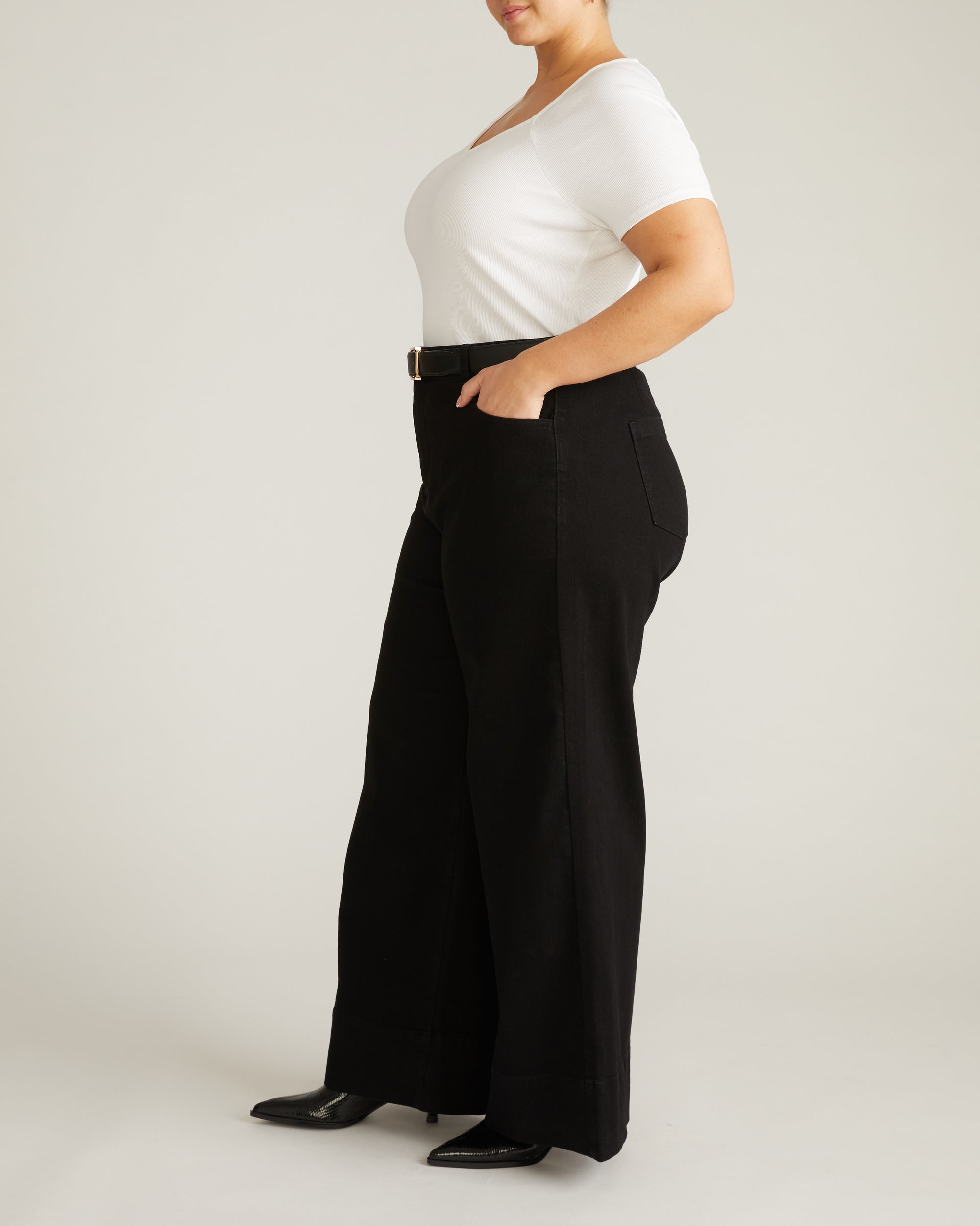 Woman wearing Carrie High Rise Wide Leg Jeans - Jet Black from Universal Standard