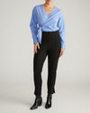 Woman wearing Skinny Pintuck Ponte Pants 28 Inch - Black from Universal Standard
