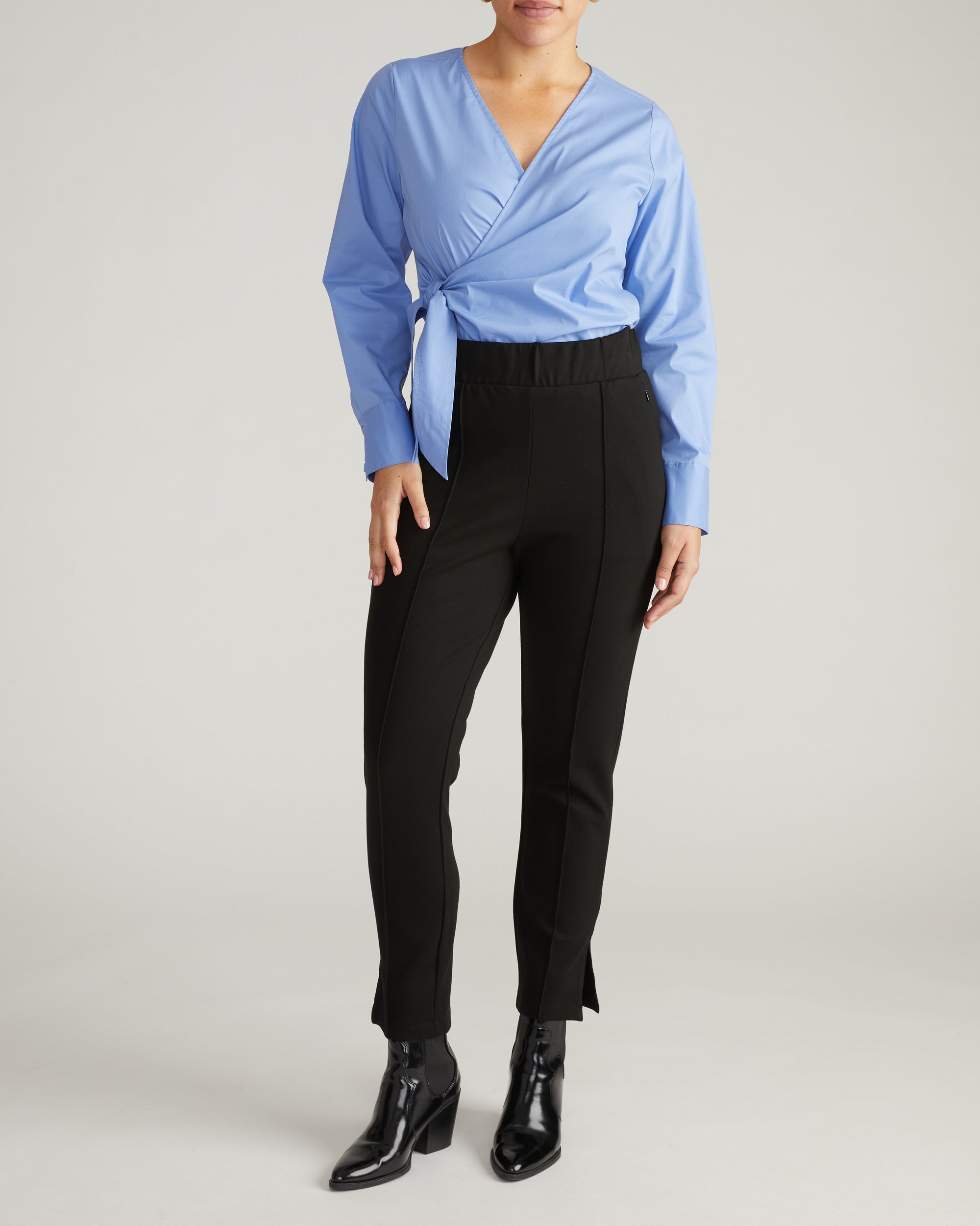 Woman wearing Skinny Pintuck Ponte Pants 28 Inch - Black from Universal Standard