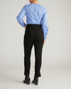 Woman wearing Skinny Pintuck Ponte Pants 28 Inch - Black from Universal Standard