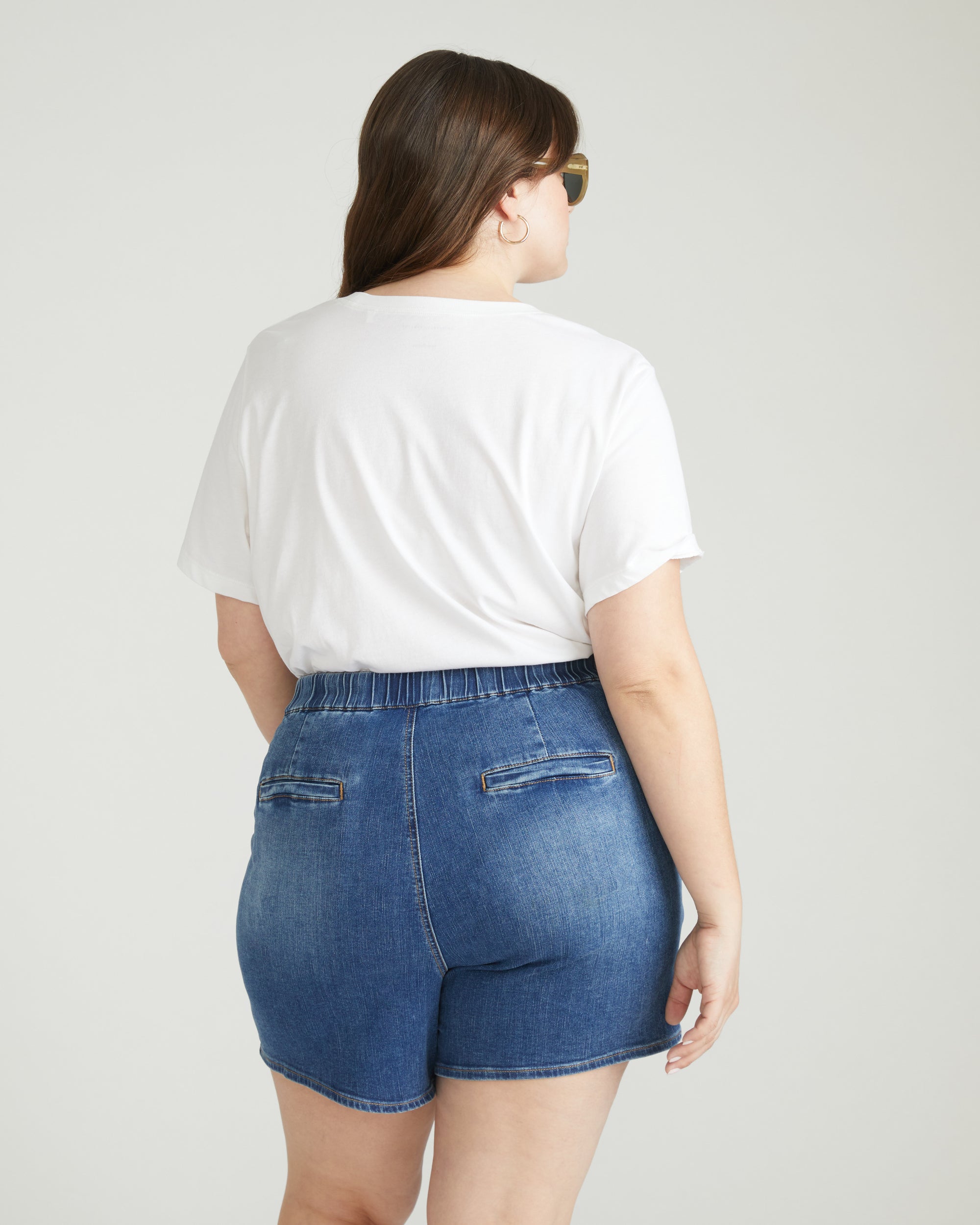 Woman wearing ComfortDenim Marche Shorts - Western Blue Wash from Universal Standard