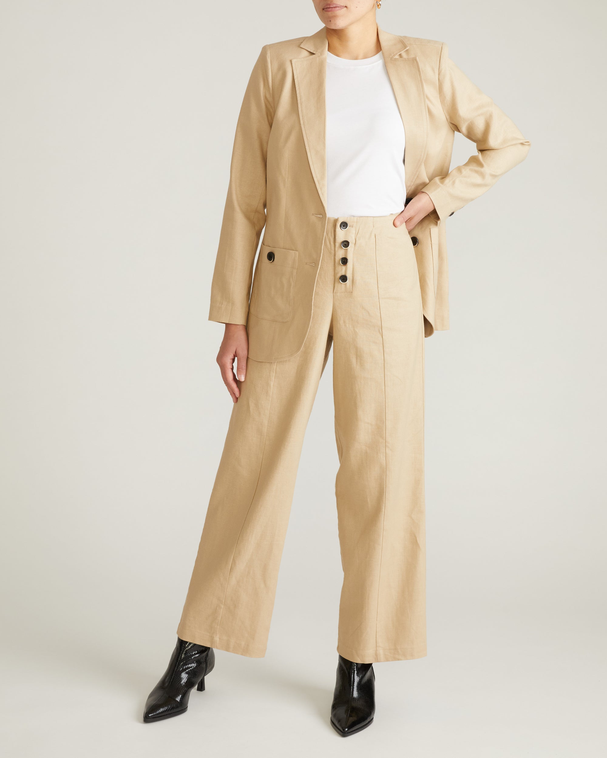 Woman wearing Coastal Linen Pants - Danish Coffee from Universal Standard