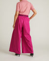Woman wearing Palais Stretch Linen Wide Leg Pant - Hyper Pink from Universal Standard