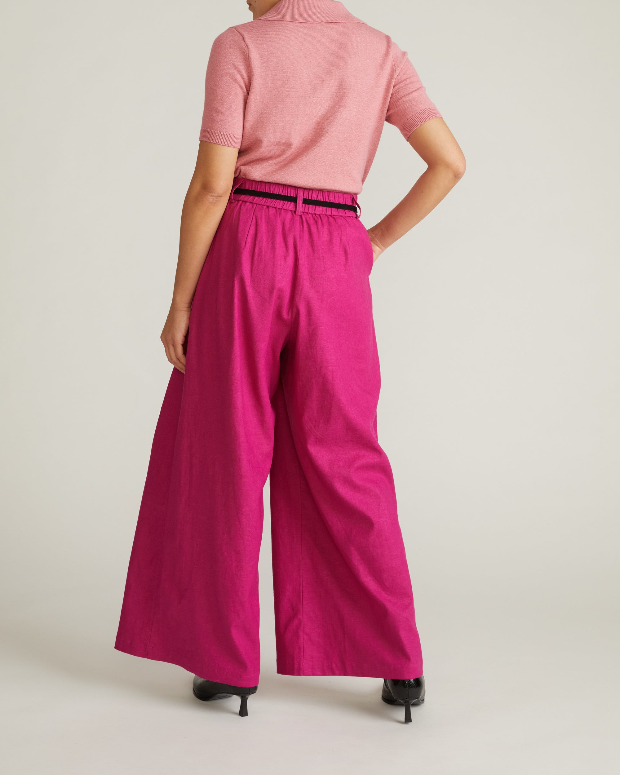 Woman wearing Palais Stretch Linen Wide Leg Pant - Hyper Pink from Universal Standard