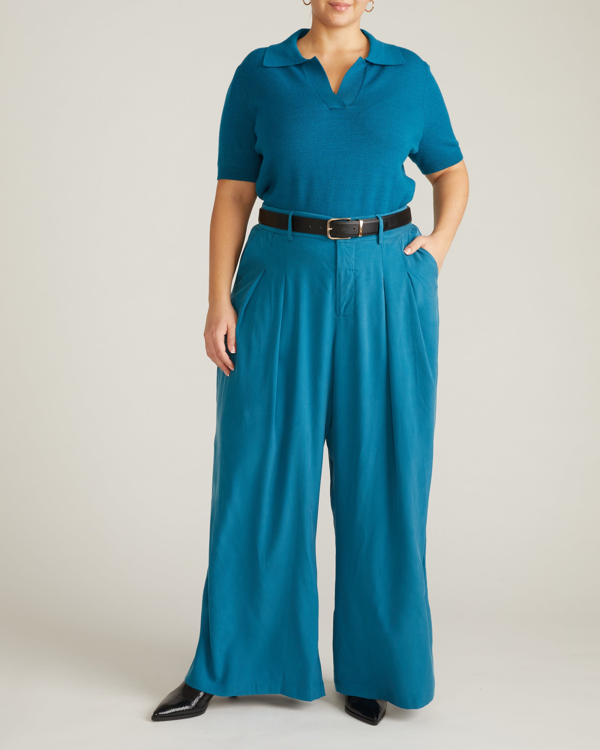 Woman wearing Palais Cooling Cupro Wide Leg Pant - Blue Beetle from Universal Standard