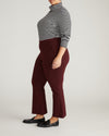 Woman wearing Amaya Ponte Kick Flare Pants - Black Cherry from Universal Standard