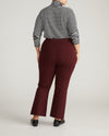 Woman wearing Amaya Ponte Kick Flare Pants - Black Cherry from Universal Standard