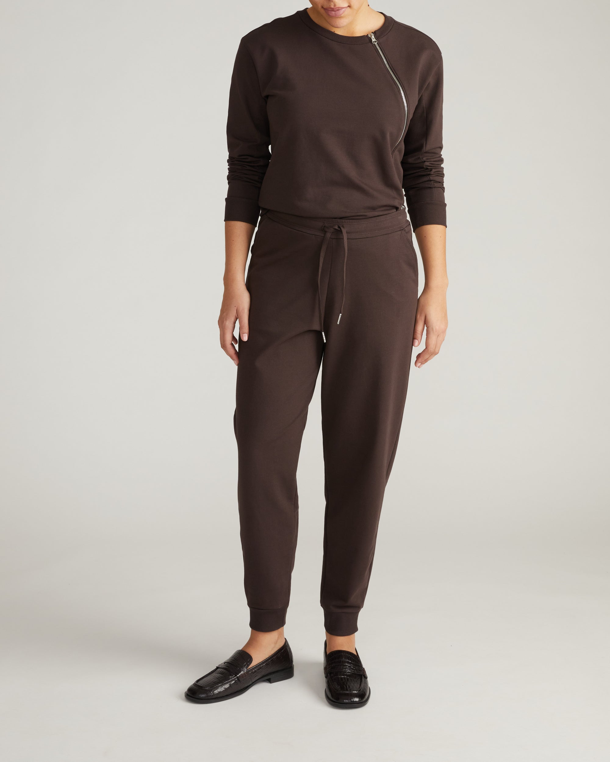 Woman wearing Selma French Terry Jogger - Deep Brown from Universal Standard