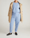 Woman wearing Selma French Terry Jogger - Graceful Blue from Universal Standard
