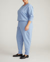 Woman wearing Selma French Terry Jogger - Graceful Blue from Universal Standard