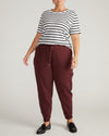 Woman wearing Selma French Terry Jogger - Black Cherry from Universal Standard
