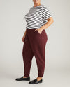 Woman wearing Selma French Terry Jogger - Black Cherry from Universal Standard