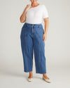 Woman wearing Keira Barrel Leg Jeans - Shallow Bay Blue from Universal Standard