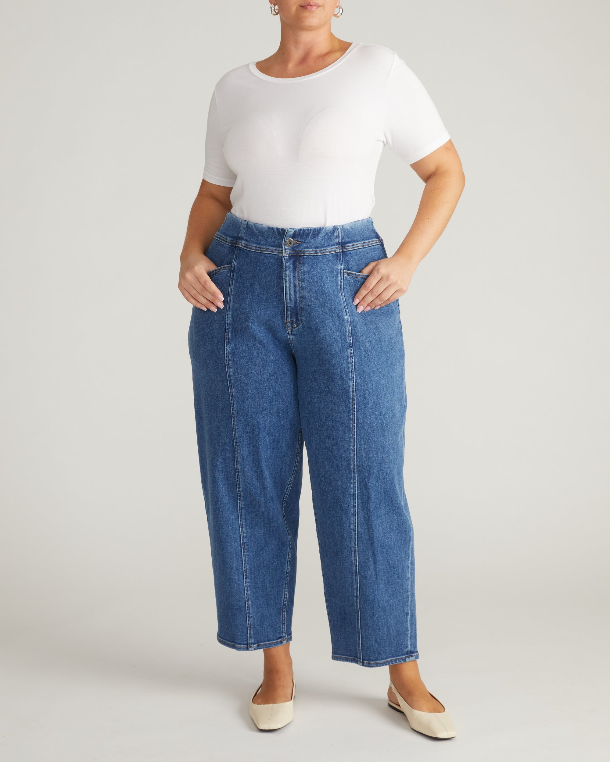 Woman wearing Keira Barrel Leg Jeans - Shallow Bay Blue from Universal Standard