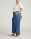 Woman wearing Keira Barrel Leg Jeans - Shallow Bay Blue from Universal Standard