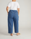 Woman wearing Keira Barrel Leg Jeans - Shallow Bay Blue from Universal Standard