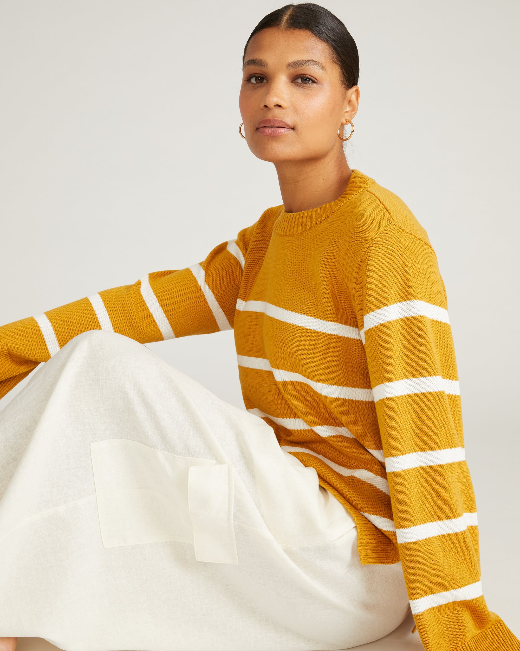 Woman wearing Bardot Wide Sleeve Cotton Sweater - Yellow Ochre/Cream Stripe from Universal Standard