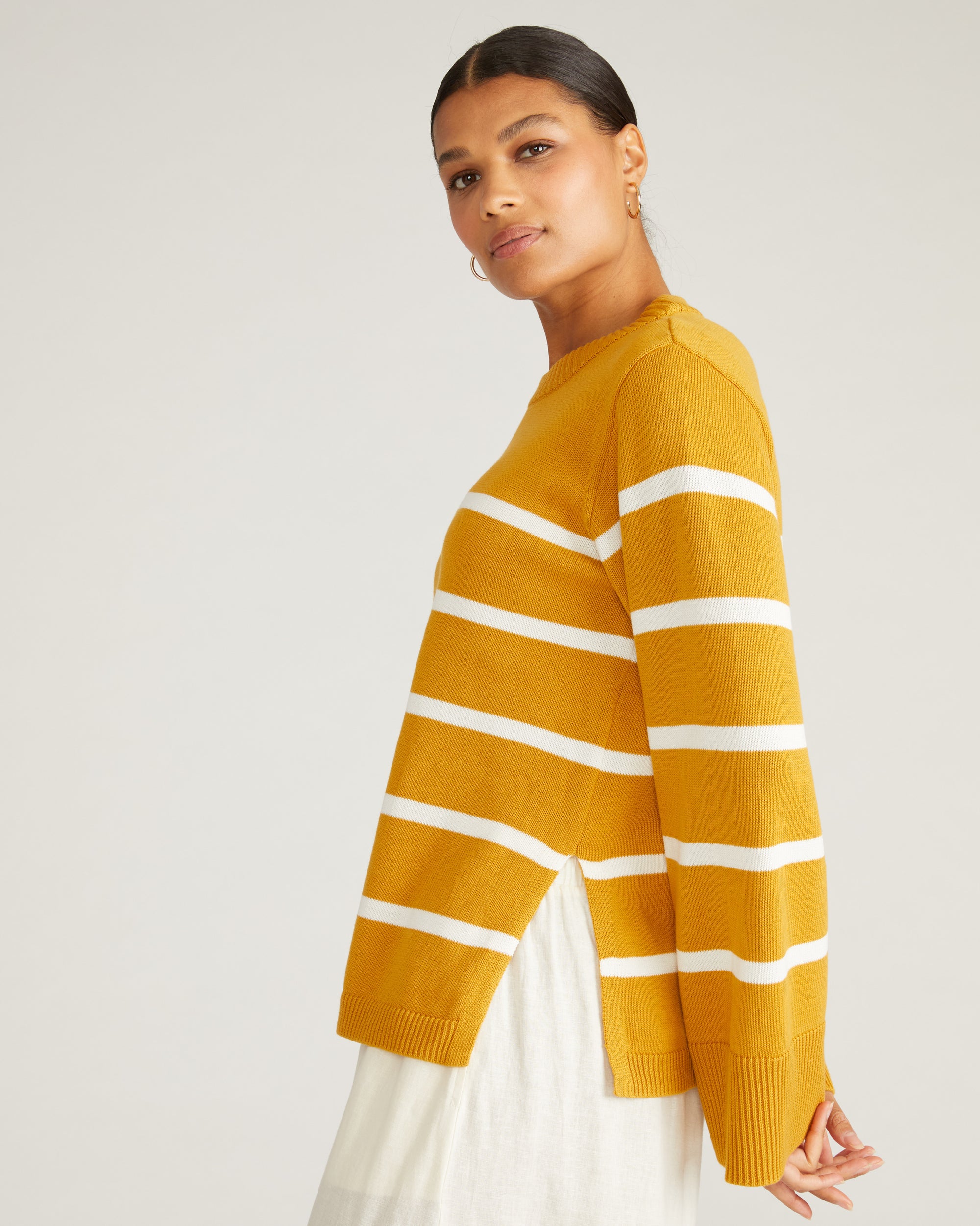 Woman wearing Bardot Wide Sleeve Cotton Sweater - Yellow Ochre/Cream Stripe from Universal Standard