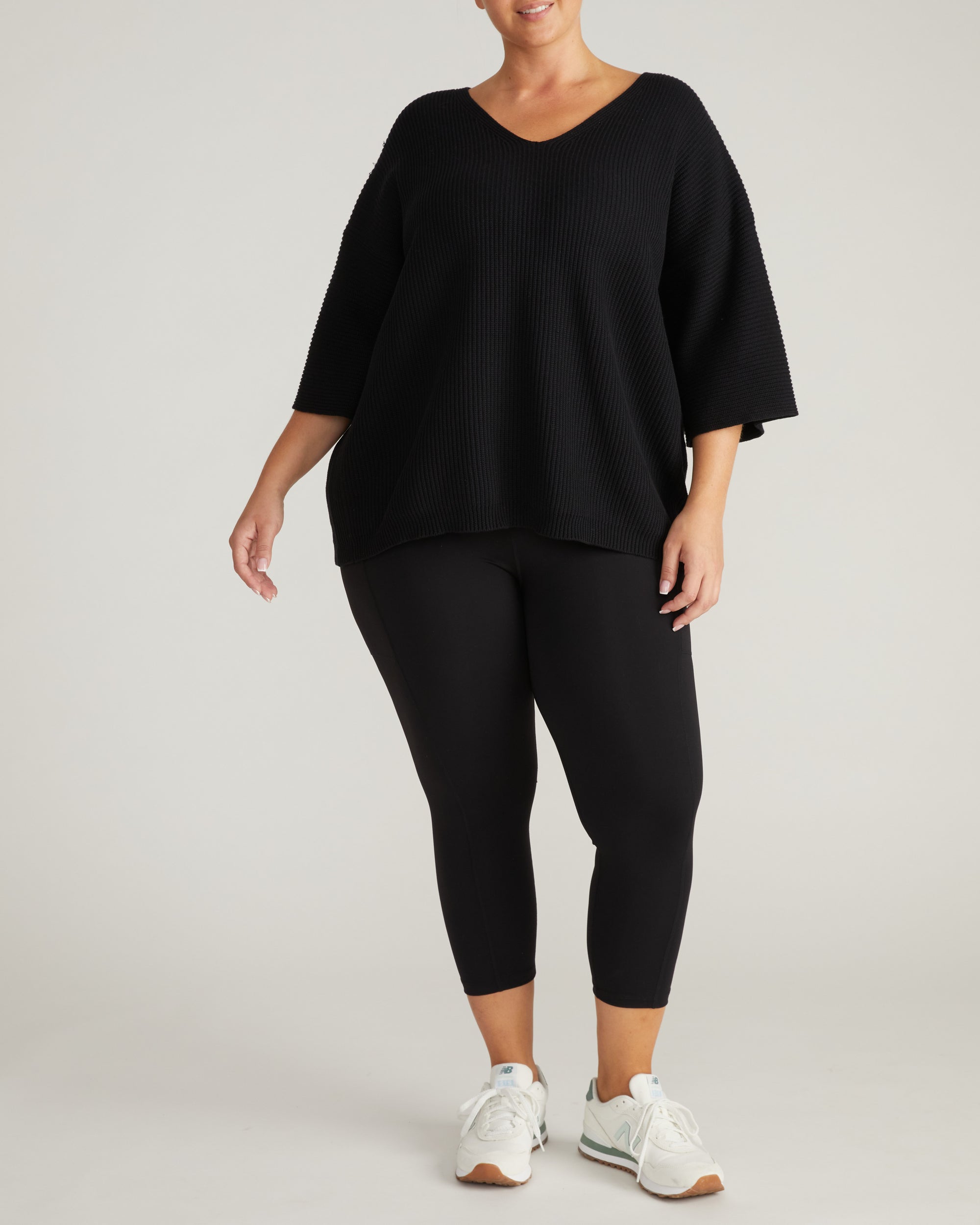 Woman wearing Lotus Sweater - Black from Universal Standard