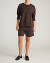 Woman wearing Fiona Side Slit Sweatshirt - Deep Brown from Universal Standard