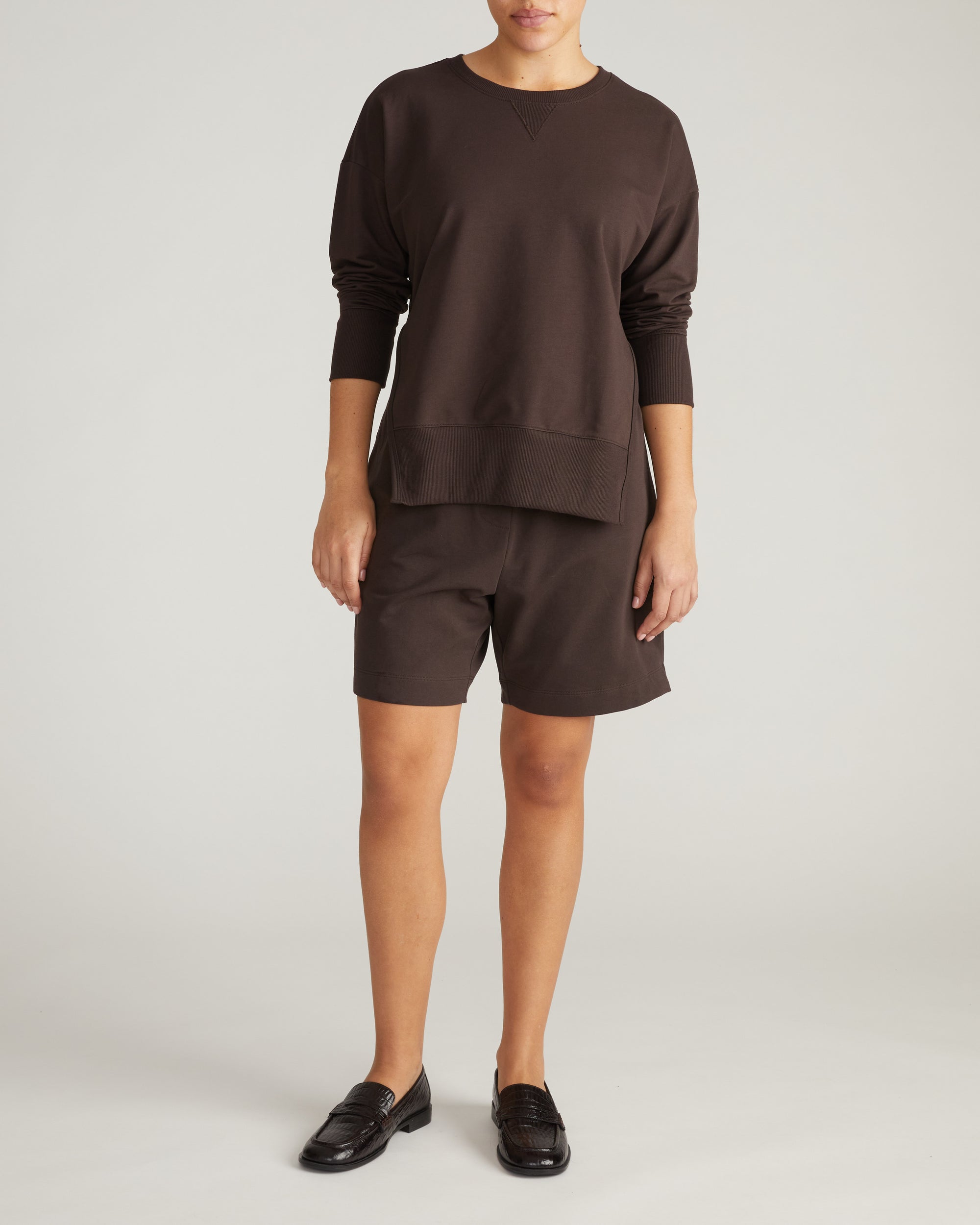 Woman wearing Fiona Side Slit Sweatshirt - Deep Brown from Universal Standard