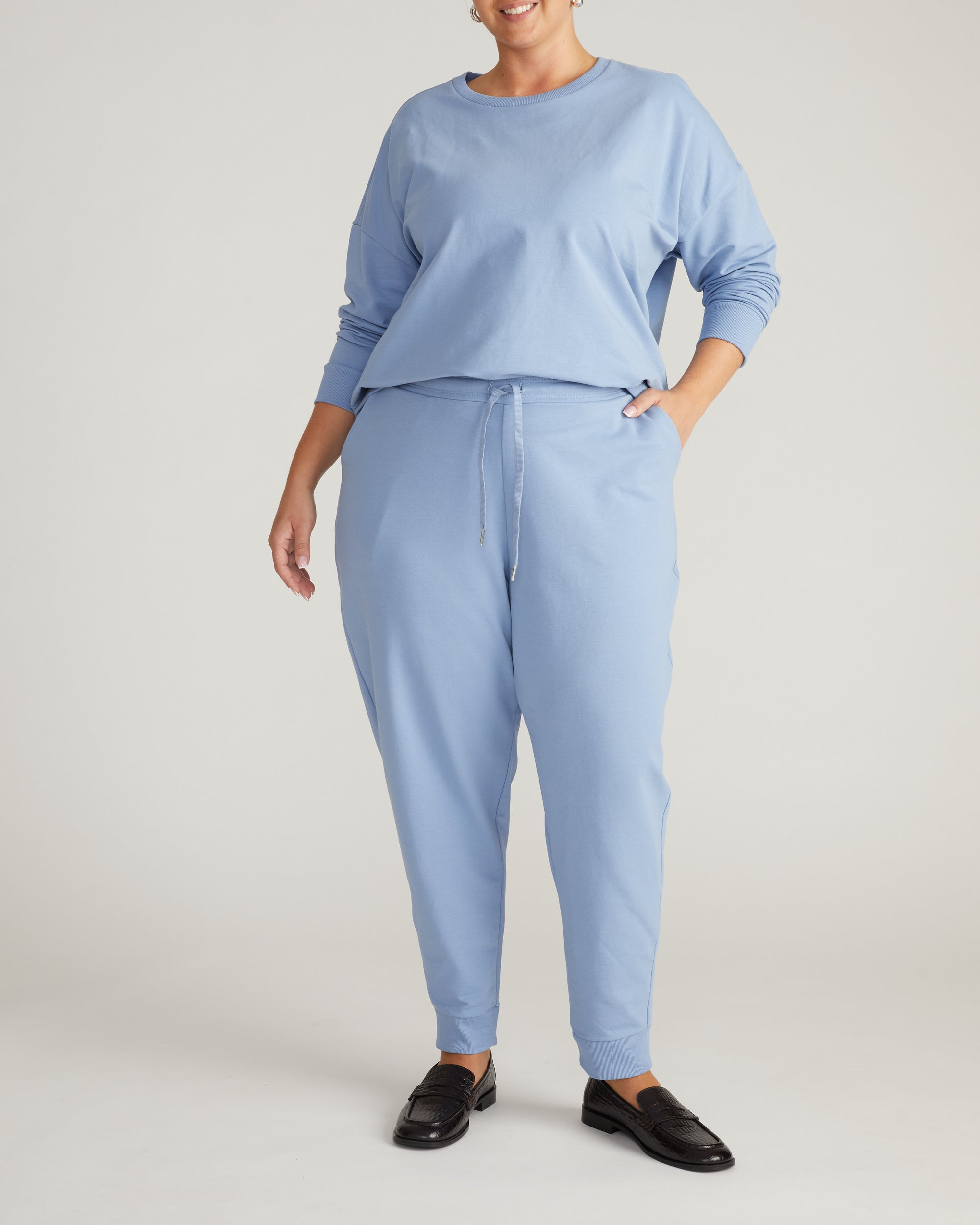 Woman wearing Lauren Classic Sweatshirt - Graceful Blue from Universal Standard