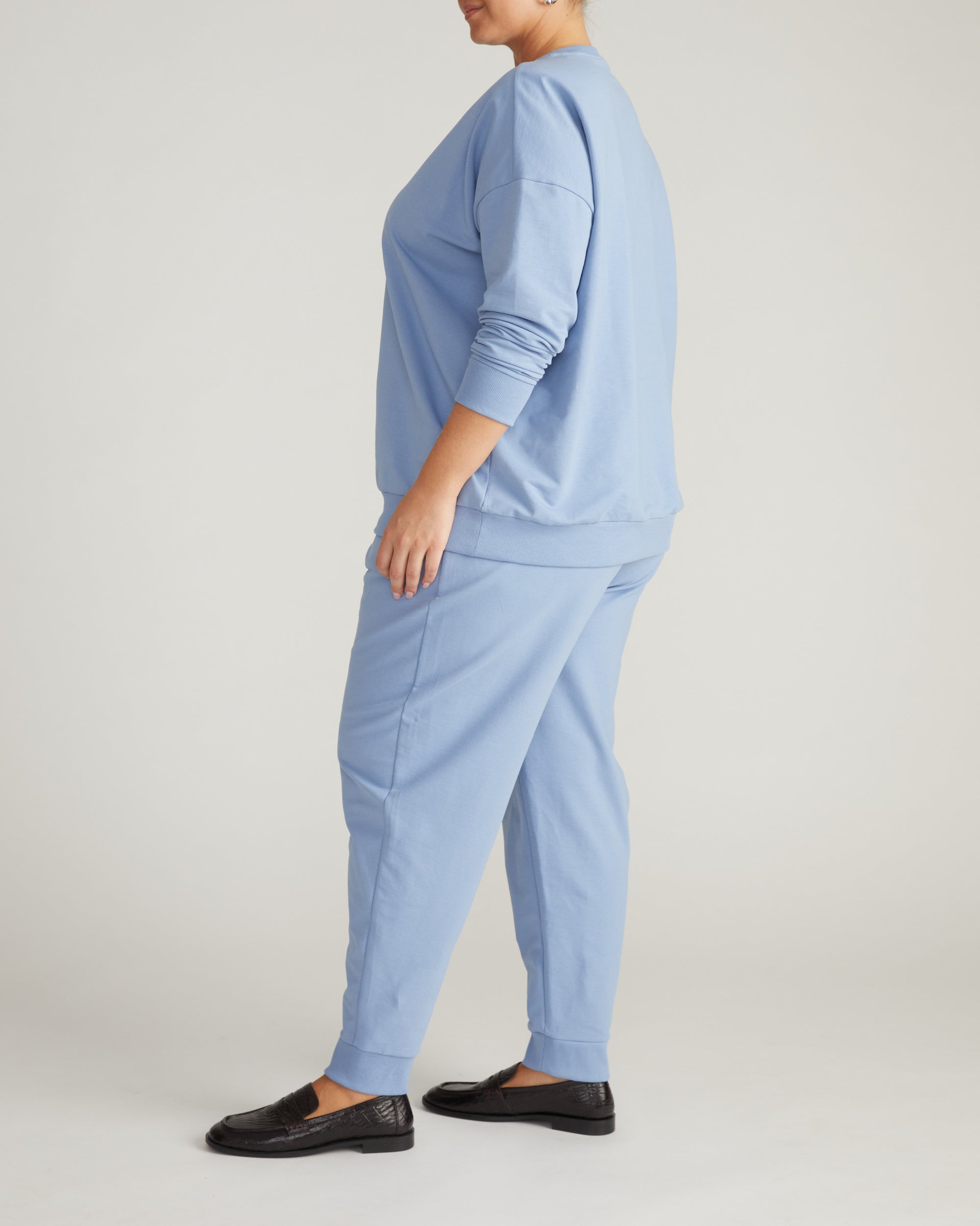 Woman wearing Lauren Classic Sweatshirt - Graceful Blue from Universal Standard