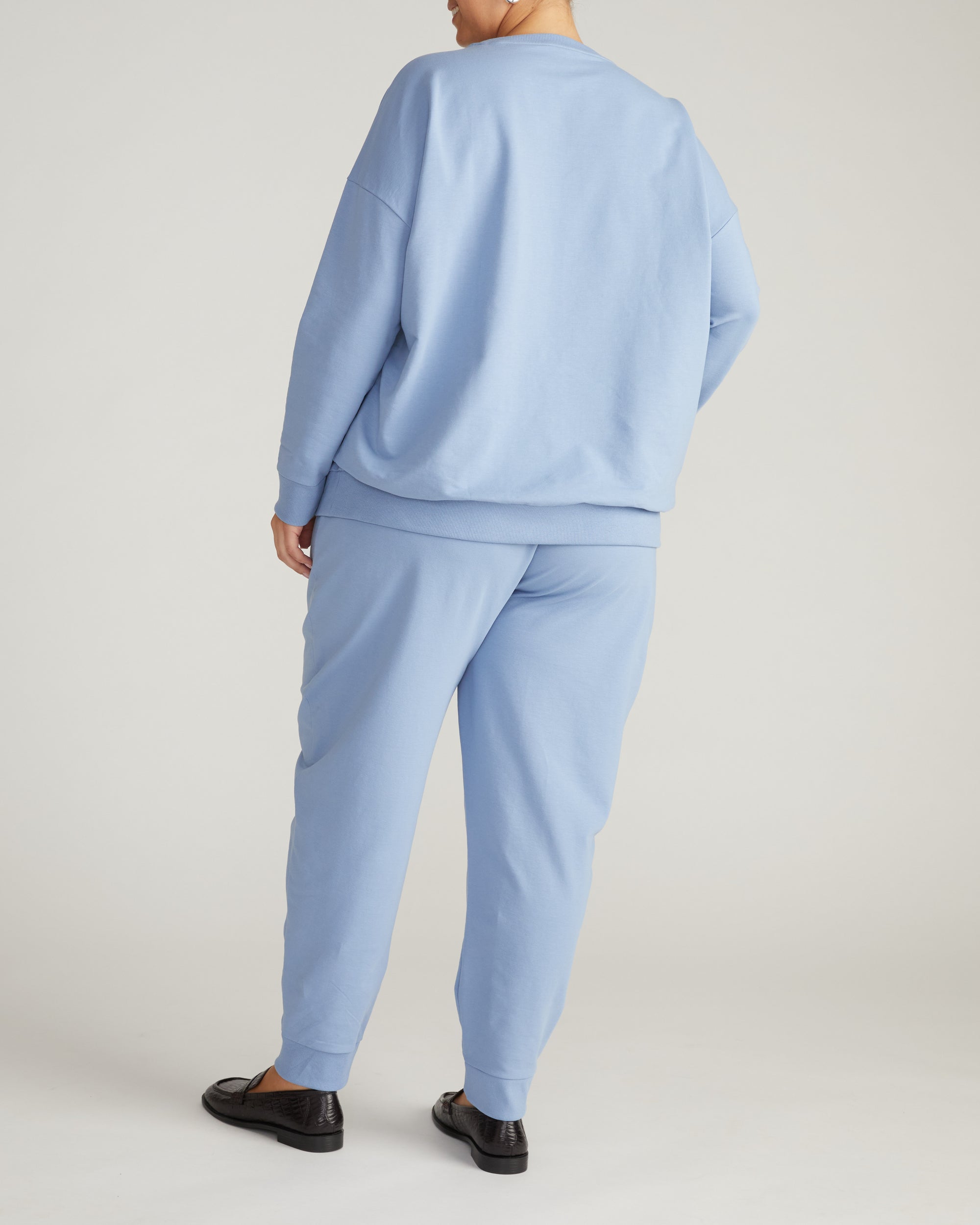 Woman wearing Lauren Classic Sweatshirt - Graceful Blue from Universal Standard