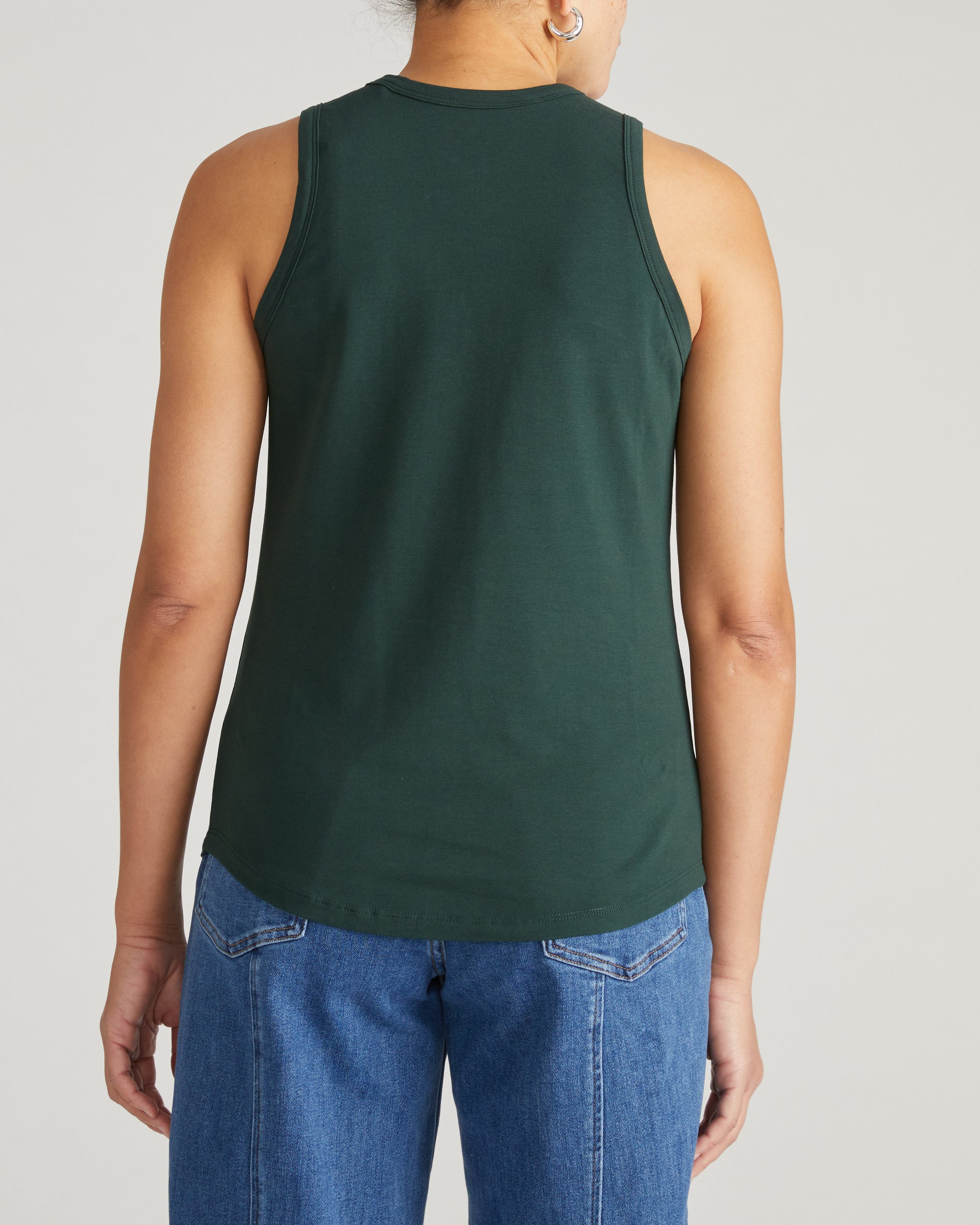 Woman wearing Cai High Neck Tank - Forest Green from Universal Standard