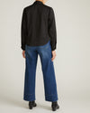 Woman wearing Georgette Satin Cambria Blouse - Black from Universal Standard
