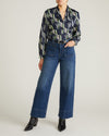 Woman wearing Georgette Satin Cambria Blouse - Paddington Ribbon Print from Universal Standard