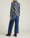 Woman wearing Georgette Satin Cambria Blouse - Paddington Ribbon Print from Universal Standard