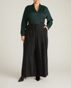 Woman wearing Georgette Satin Cambria Blouse - Forest Green from Universal Standard