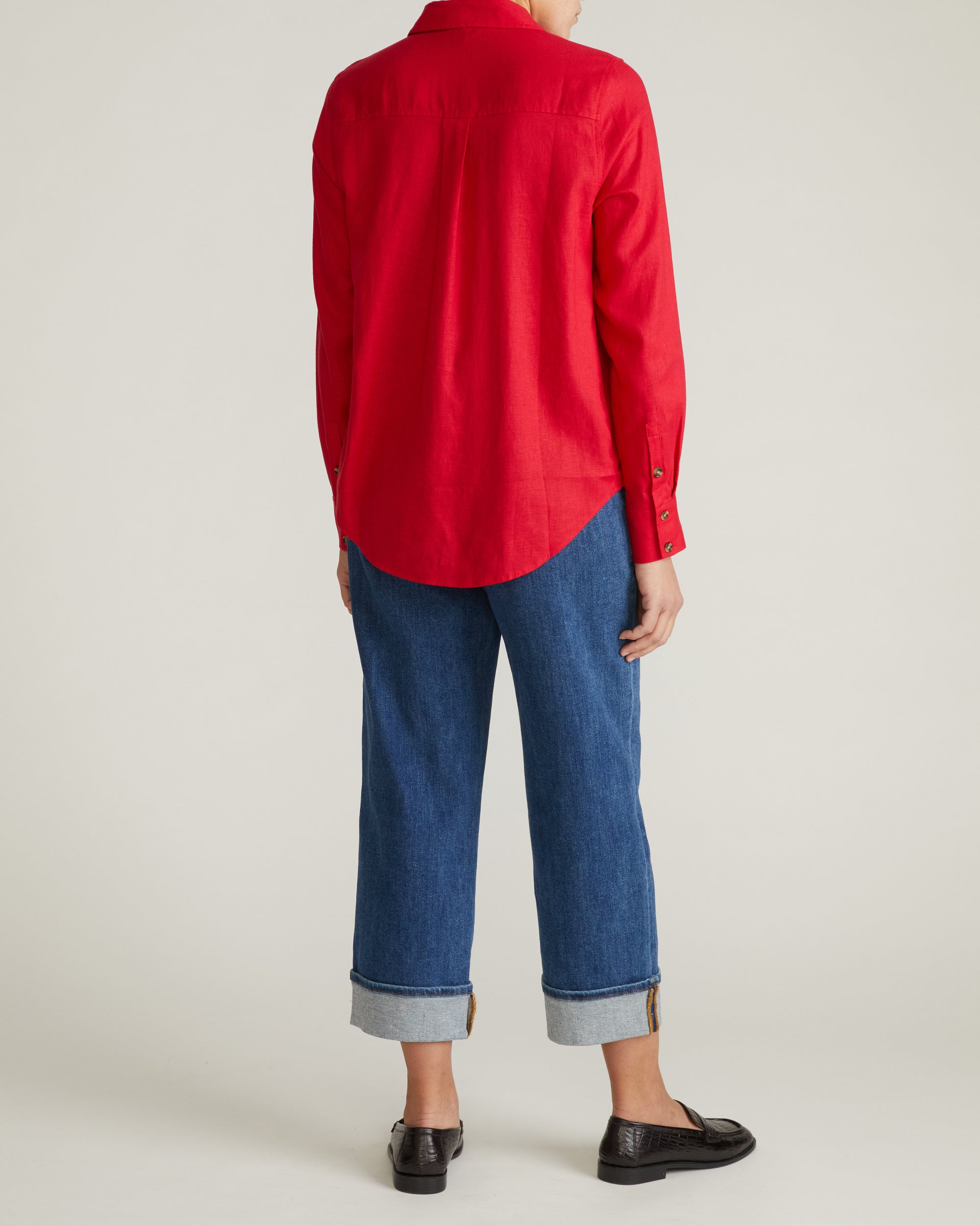Woman wearing Elbe Stretch Linen Shirt - Brilliant Red from Universal Standard