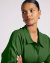 Woman wearing Elbe Stretch Linen Shirt - Green Park from Universal Standard