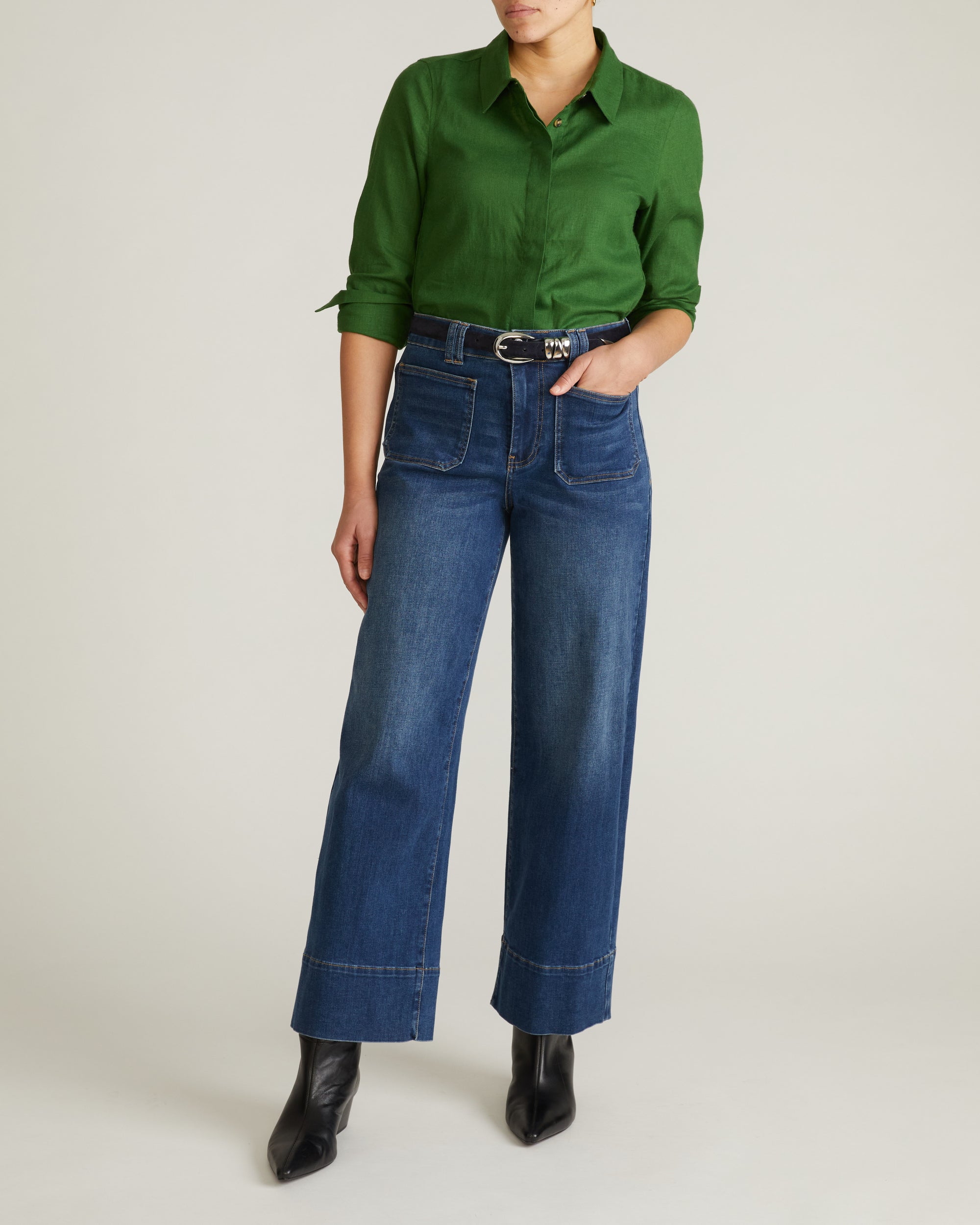 Woman wearing Elbe Stretch Linen Shirt - Green Park from Universal Standard