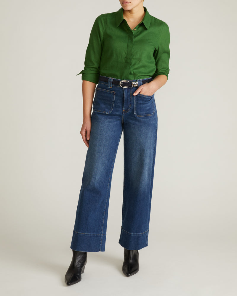 Woman wearing Elbe Stretch Linen Shirt - Green Park from Universal Standard