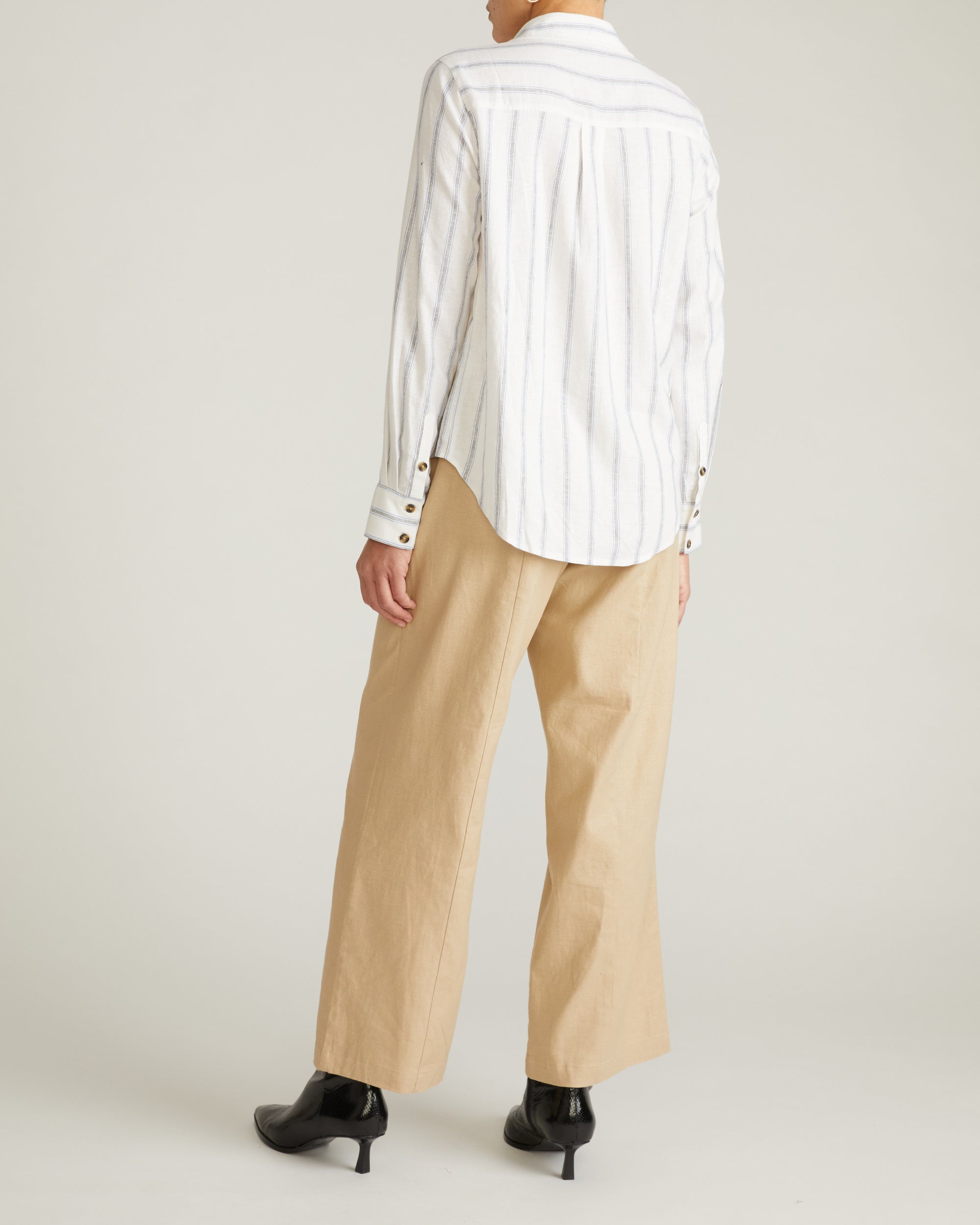 Woman wearing Elbe Stretch Linen Shirt - Mayfair Stripe from Universal Standard