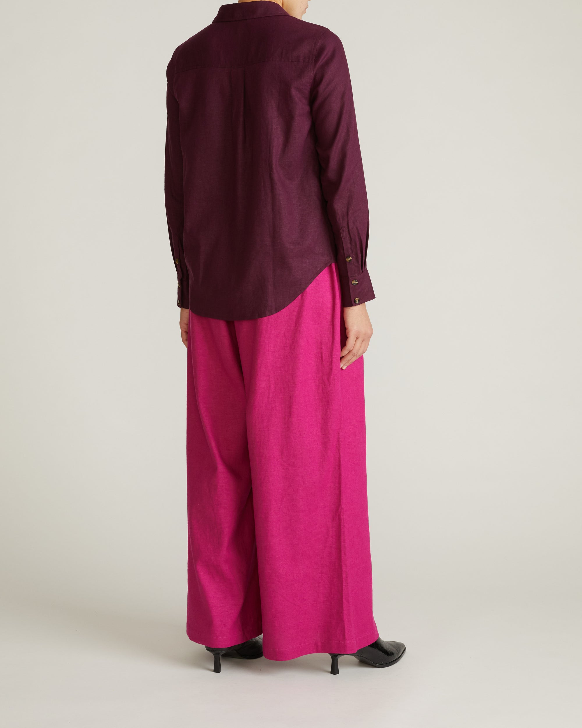 Woman wearing Elbe Stretch Linen Shirt - Acai from Universal Standard