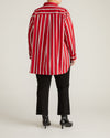 Woman wearing The Artist Poplin Shirt - Red/Black/White Stripe from Universal Standard