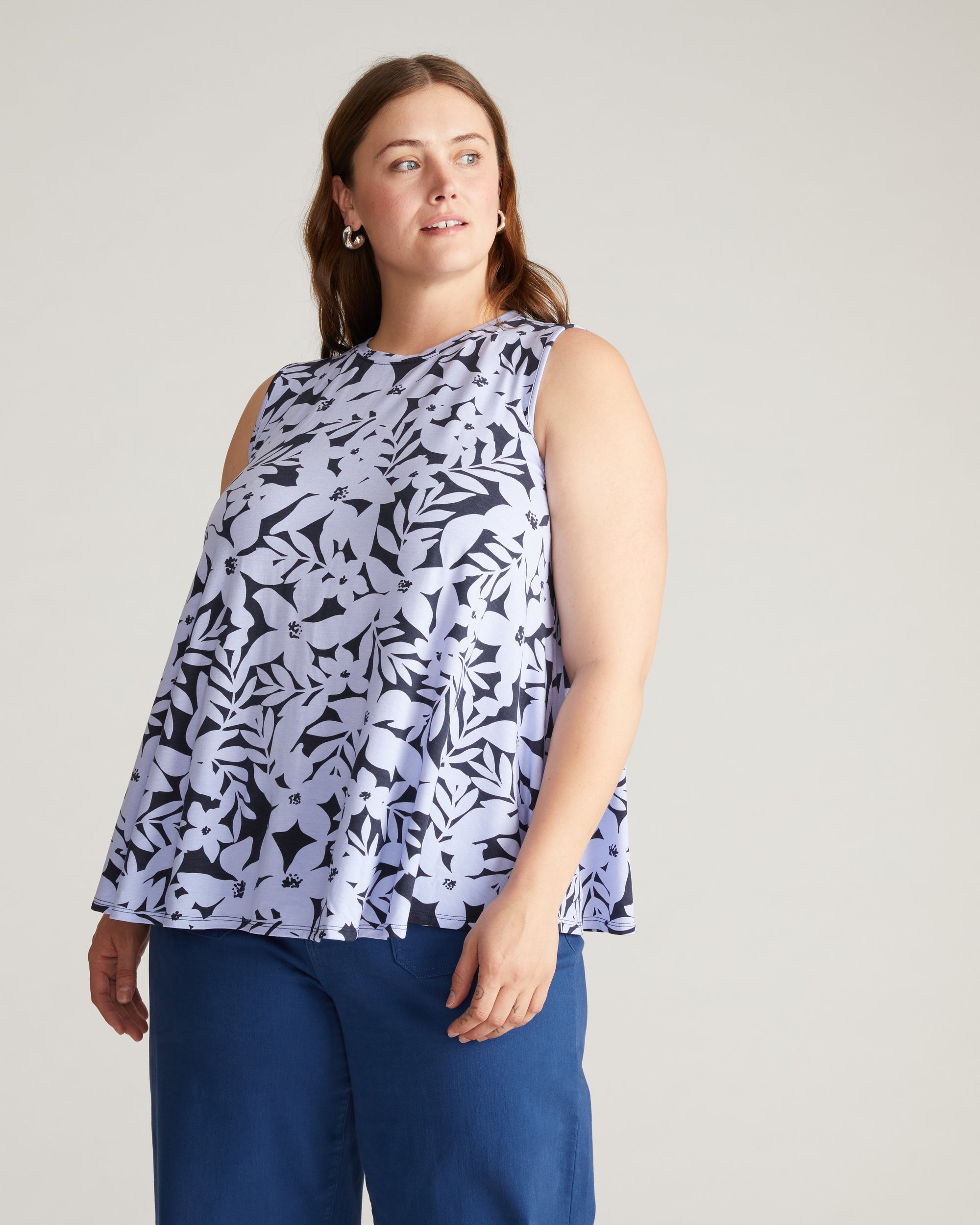 Woman wearing Heatwave Divine Jersey Flared Tank - Petal Palette Print in Jacaranda from Overstock Sale