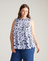 Woman wearing Heatwave Divine Jersey Flared Tank - Petal Palette Print in Jacaranda from Overstock Sale