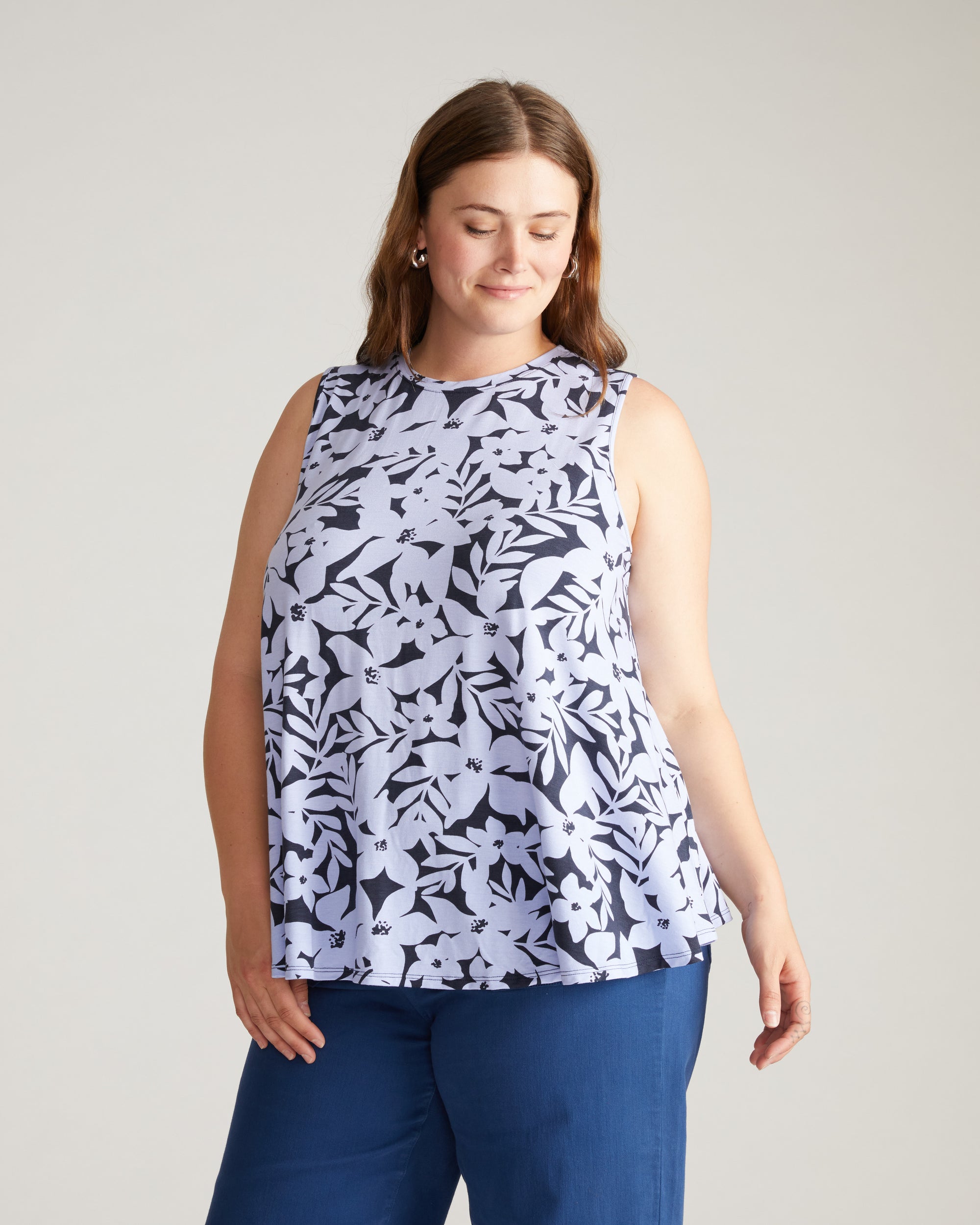 Woman wearing Heatwave Divine Jersey Flared Tank - Petal Palette Print in Jacaranda from Overstock Sale