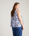 Woman wearing Heatwave Divine Jersey Flared Tank - Petal Palette Print in Jacaranda from Overstock Sale