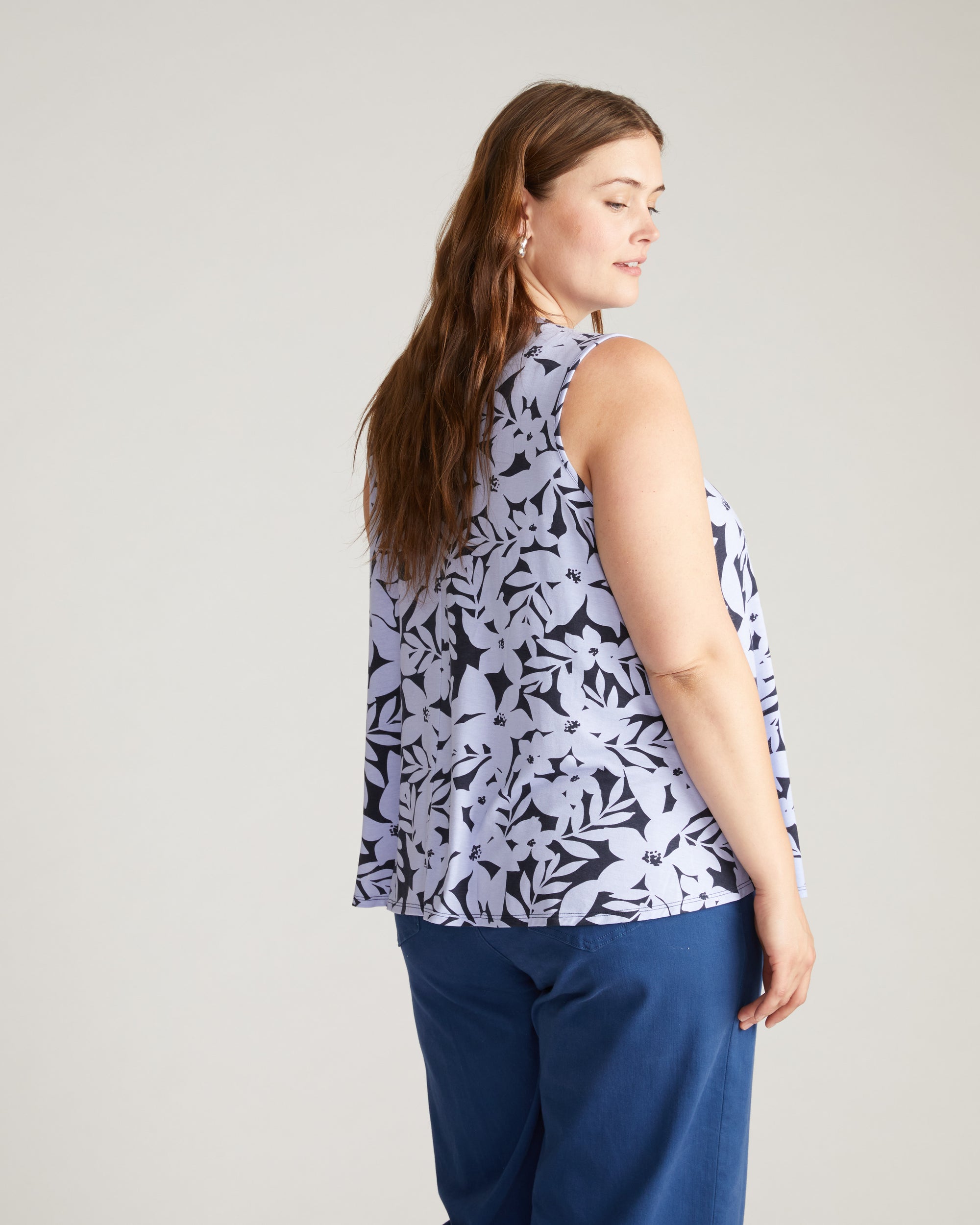 Woman wearing Heatwave Divine Jersey Flared Tank - Petal Palette Print in Jacaranda from Overstock Sale