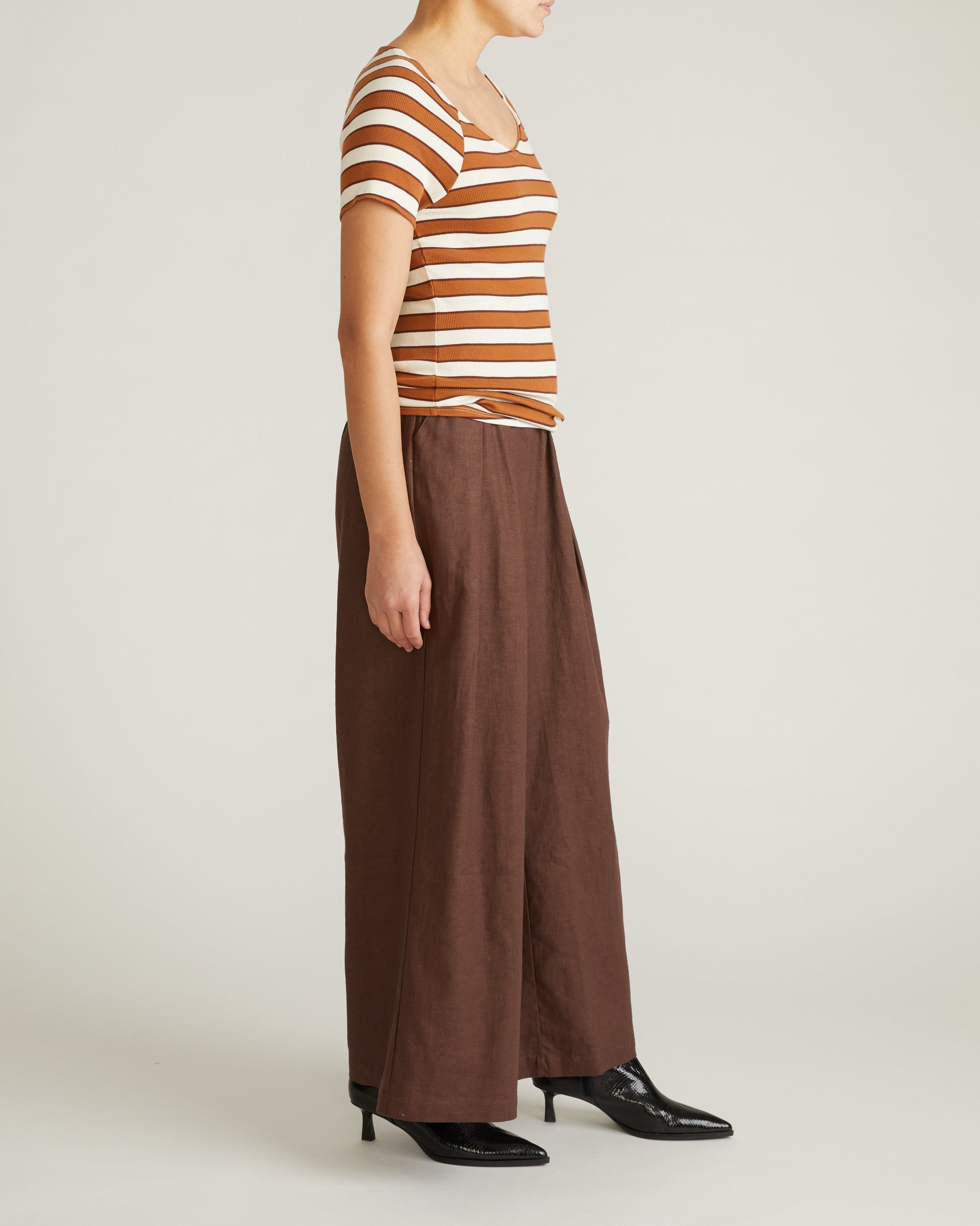 Woman wearing Carey Ribbed Top - Baker Street Stripe from Universal Standard