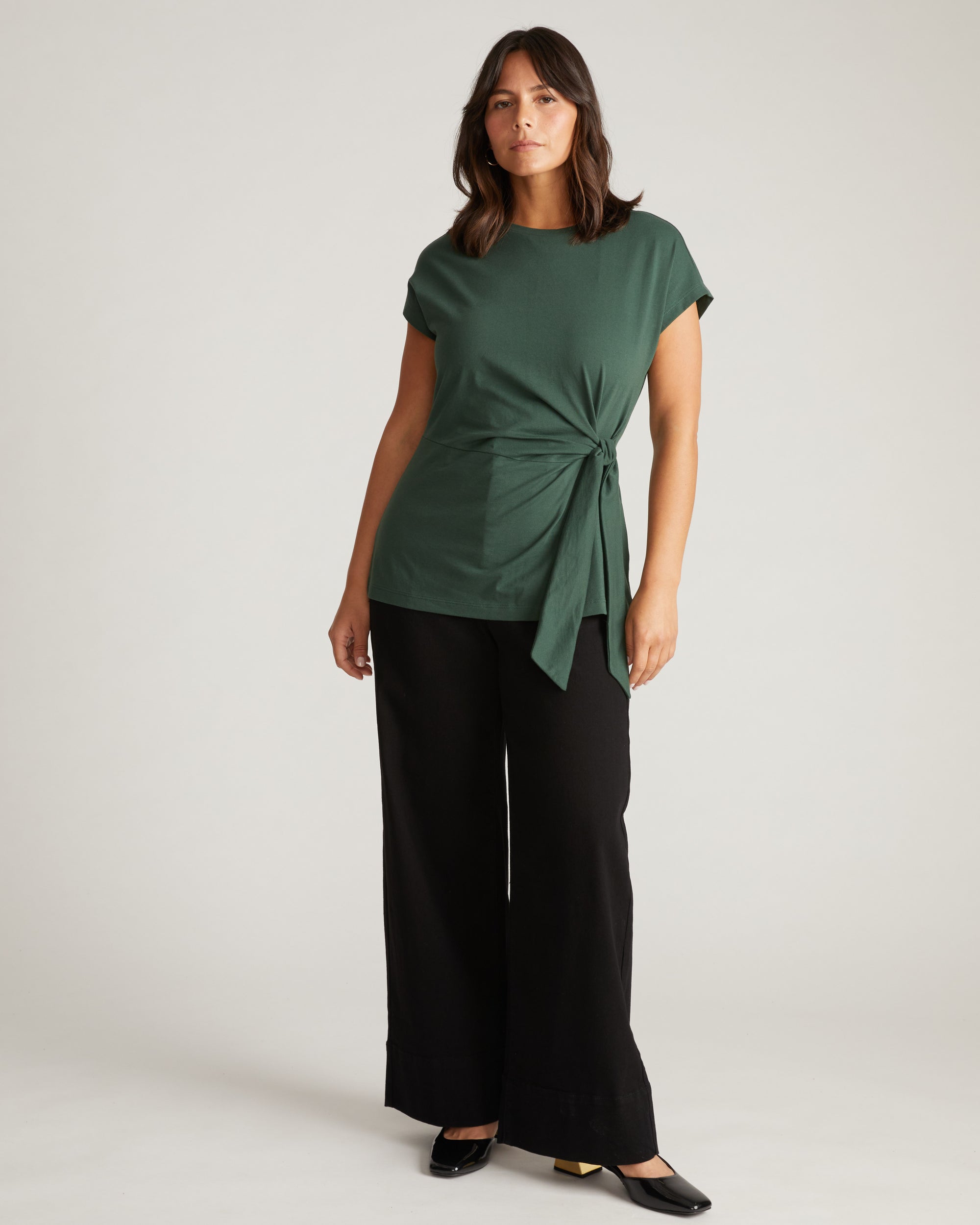 Woman wearing Crescent Breton Stripe Knot Tee - Solid Conifer from Universal Standard