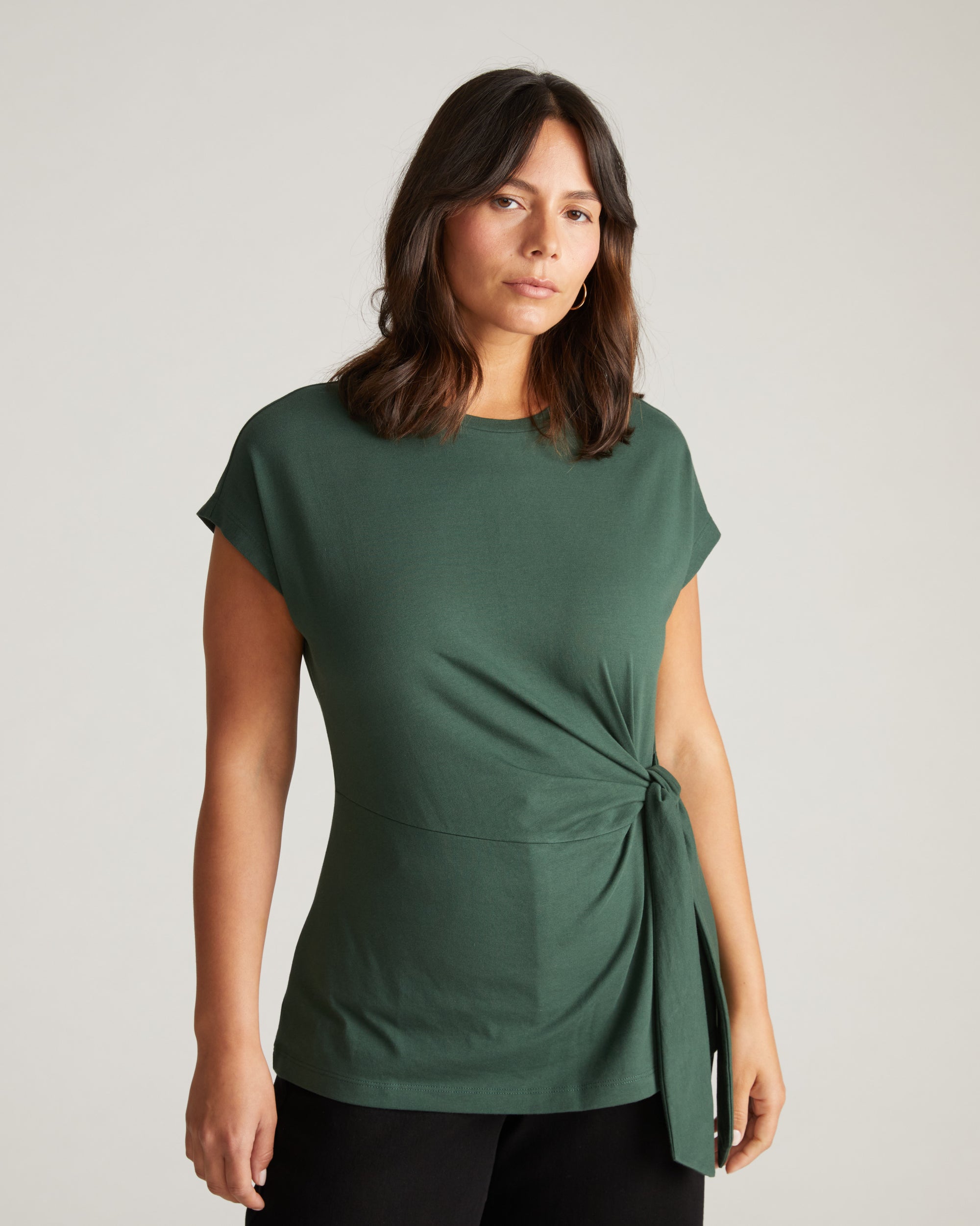 Woman wearing Crescent Breton Stripe Knot Tee - Solid Conifer from Universal Standard