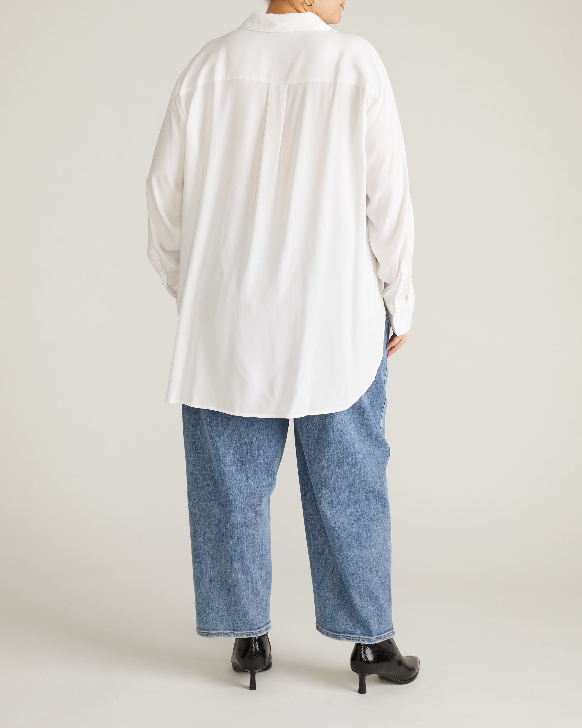 Woman wearing Cooling Stretch Cupro Artist Shirt - White from Universal Standard