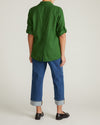Woman wearing Button Back Linen Polo Shirt - Green Park from Universal Standard